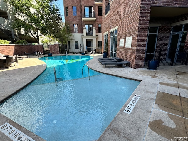 view of pool with a patio