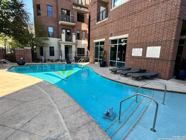 view of pool with a patio area