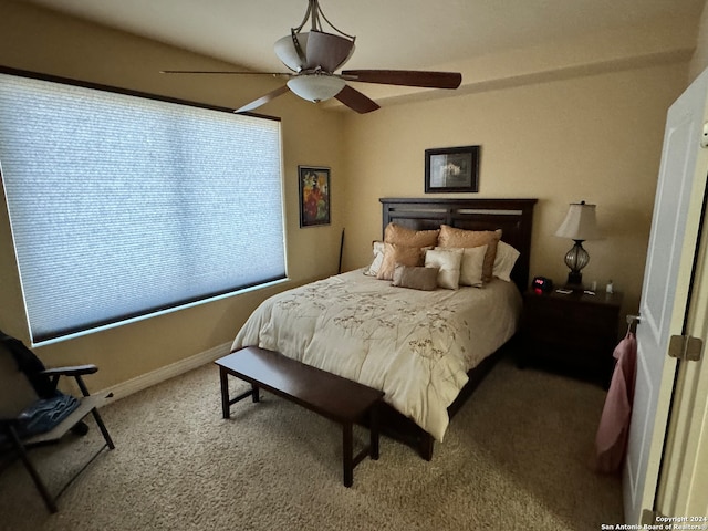 bedroom featuring ceiling fan and carpet floors