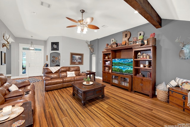 living room featuring beam ceiling, ceiling fan, and light wood-type flooring