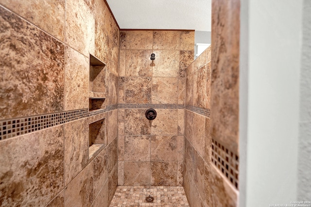 details with a tile shower