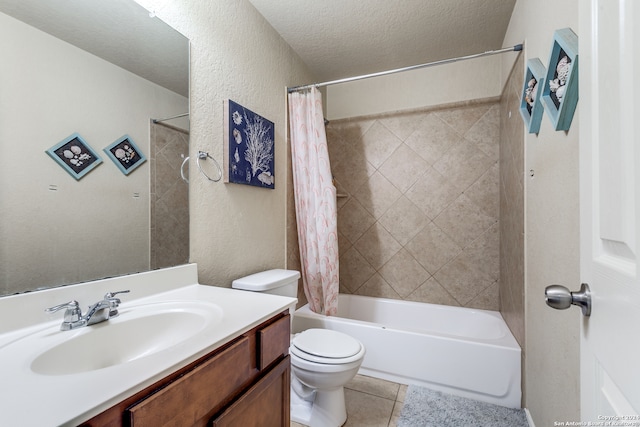 full bathroom featuring toilet, large vanity, shower / bath combo with shower curtain, a textured ceiling, and tile flooring