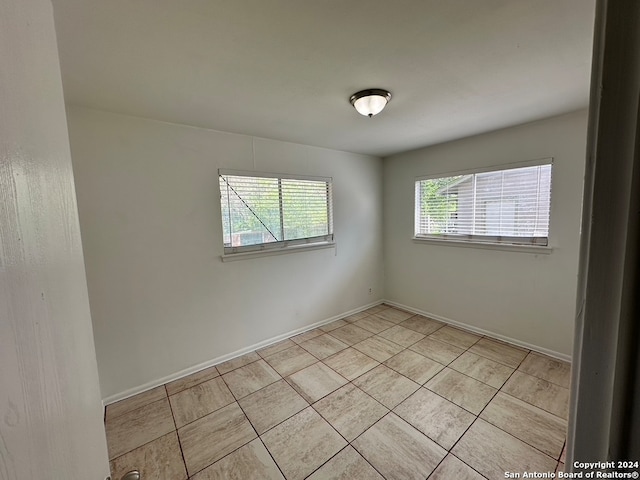 view of tiled empty room