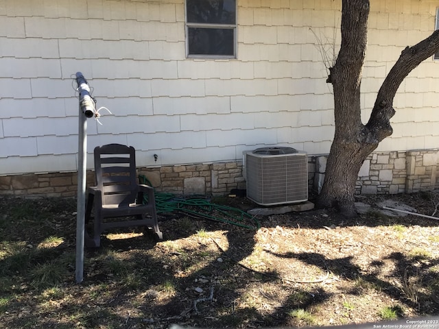 exterior details featuring central AC unit