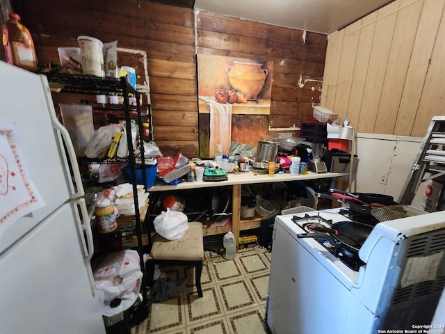 interior space with wood walls and washer / clothes dryer