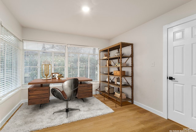 home office featuring light wood-type flooring