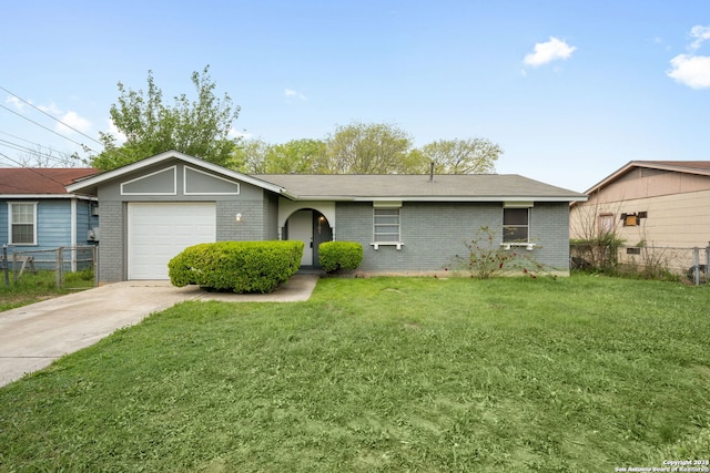 single story home with a front yard and a garage