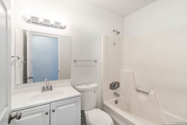 full bathroom with shower / bath combination, oversized vanity, and toilet