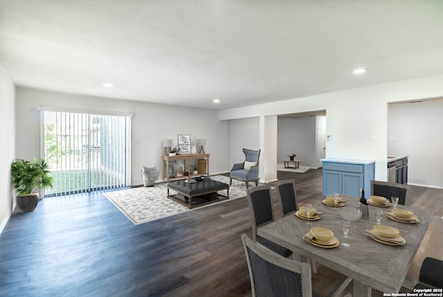 dining room featuring dark hardwood / wood-style flooring