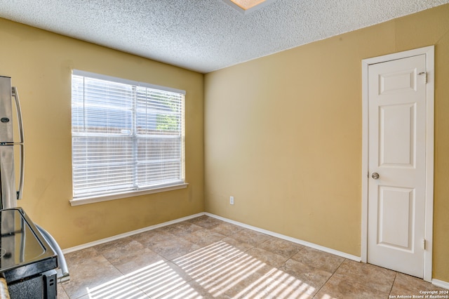 interior space featuring a textured ceiling