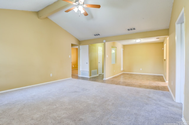 carpeted spare room with beam ceiling, high vaulted ceiling, and ceiling fan