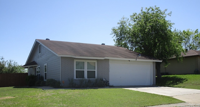 single story home with a front lawn and a garage