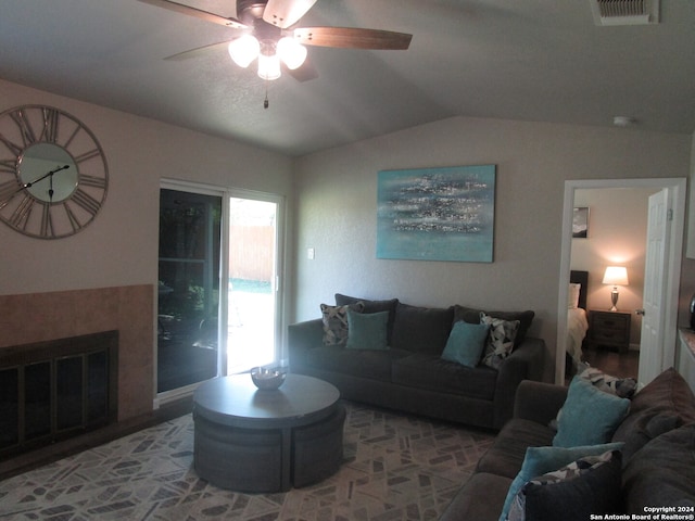 living room featuring lofted ceiling and ceiling fan