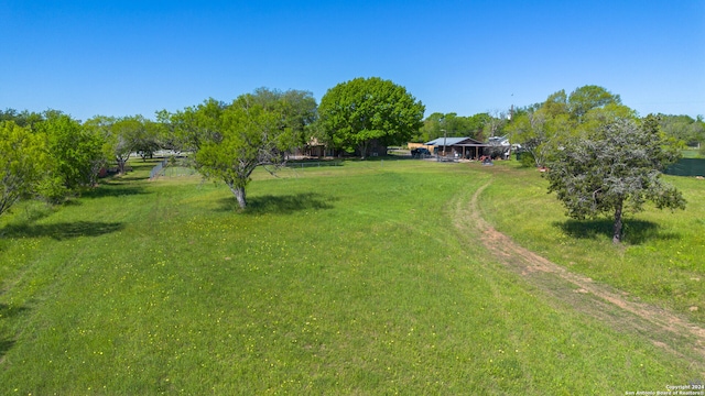 view of yard with a rural view