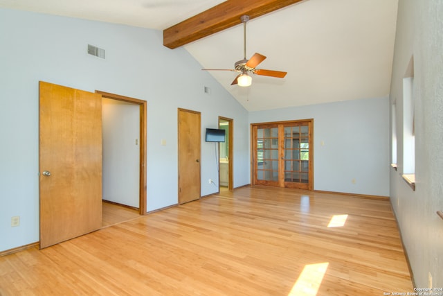 unfurnished bedroom featuring light hardwood / wood-style floors, ceiling fan, beam ceiling, high vaulted ceiling, and french doors