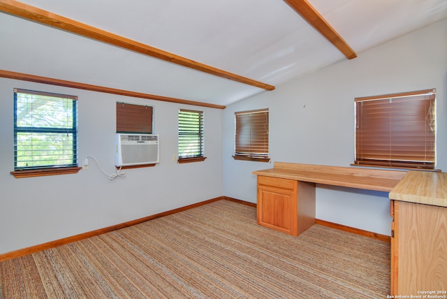 unfurnished office featuring vaulted ceiling with beams and light colored carpet