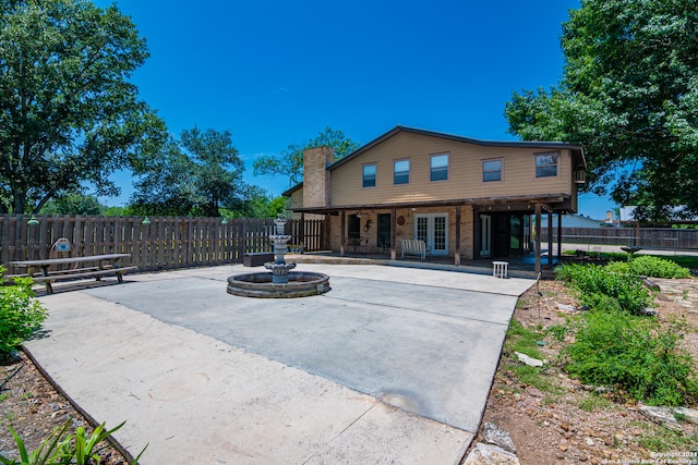 back of house featuring a patio