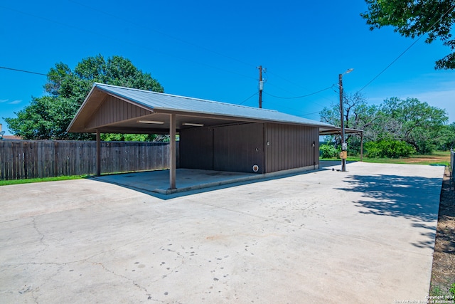 garage featuring a carport