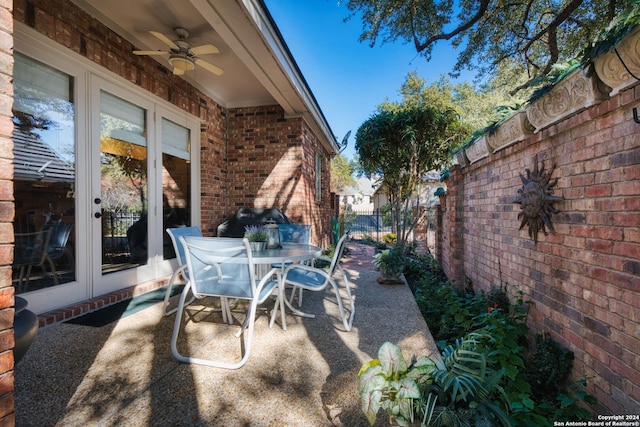 view of patio / terrace featuring french doors and ceiling fan