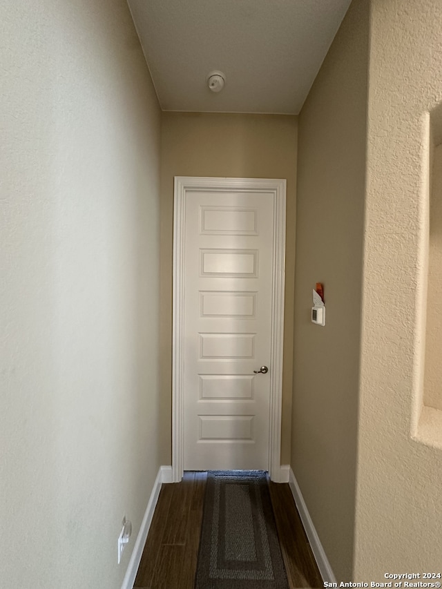 hallway featuring hardwood / wood-style floors