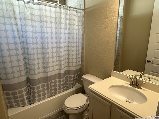 full bathroom with vanity, toilet, and shower / bath combo with shower curtain