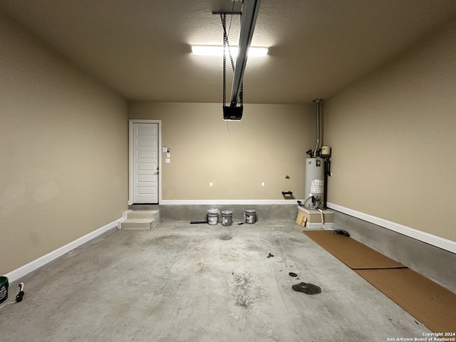 garage featuring a garage door opener and water heater