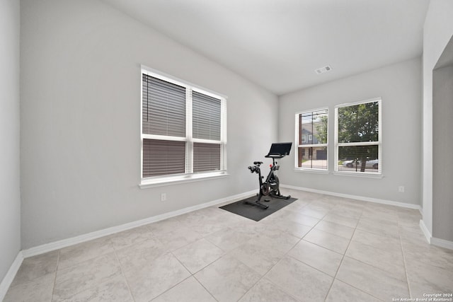 exercise area with light tile flooring