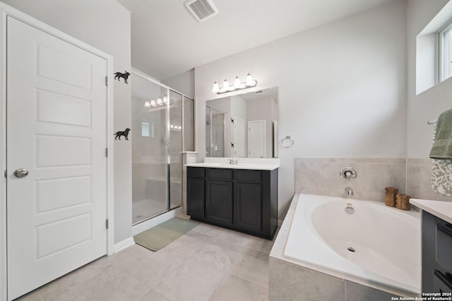 bathroom featuring shower with separate bathtub, tile floors, a chandelier, and vanity