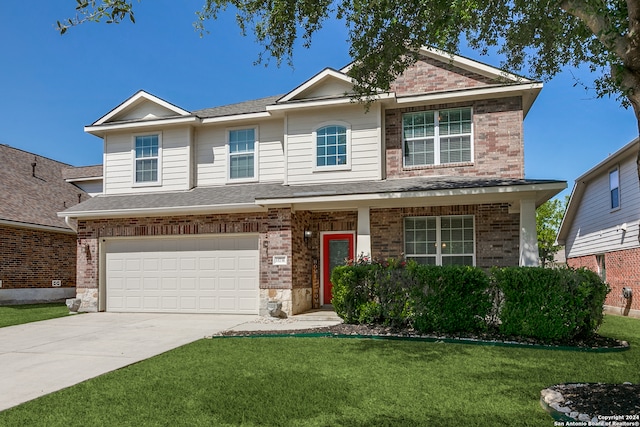 view of front facade featuring a front lawn and a garage