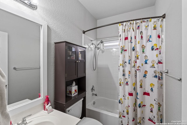 full bathroom featuring toilet, shower / bath combo, and sink