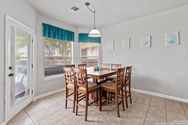 dining room with light tile flooring