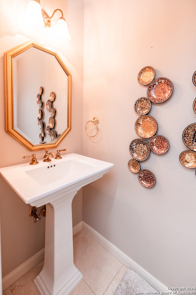 bathroom with tile floors