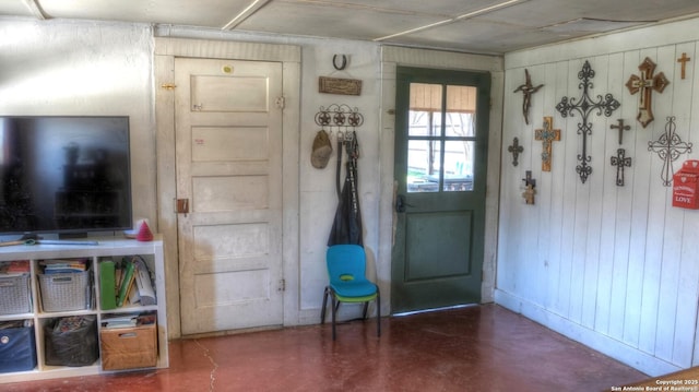 entryway with concrete floors