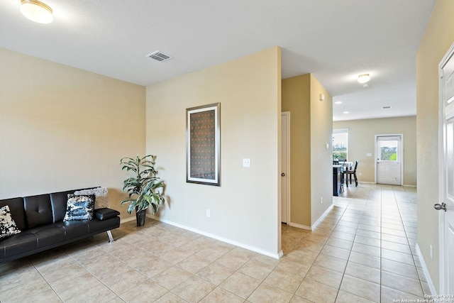 interior space featuring light tile floors