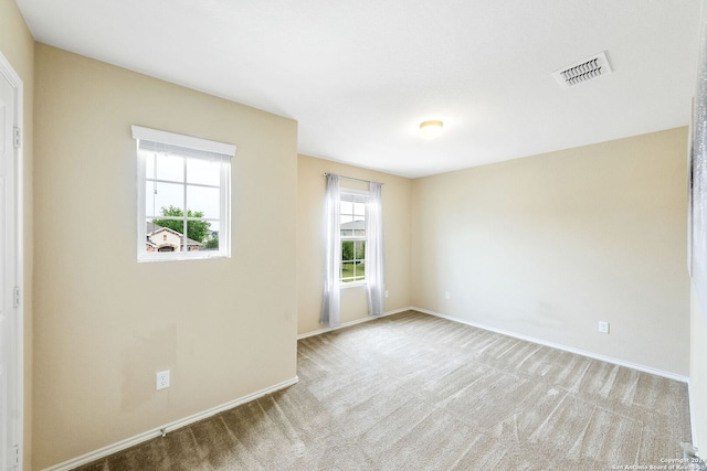 view of carpeted spare room