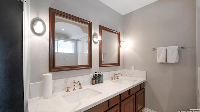 bathroom with double vanity