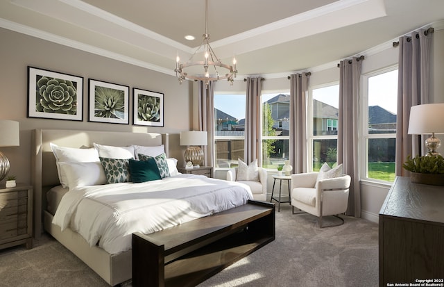 bedroom featuring crown molding, a raised ceiling, dark colored carpet, and an inviting chandelier