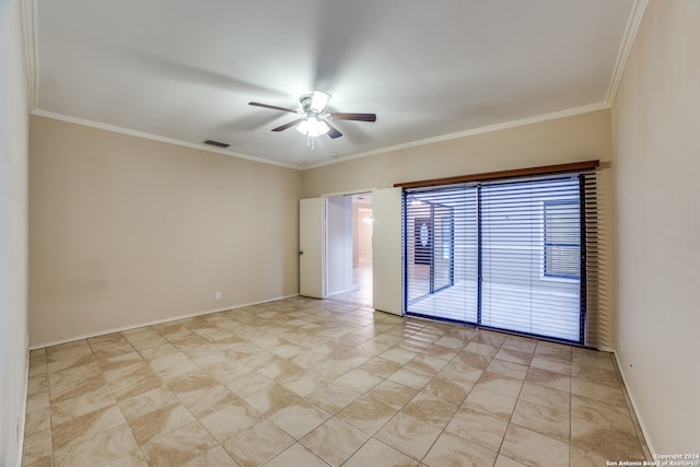 empty room with ornamental molding, ceiling fan, and light tile flooring