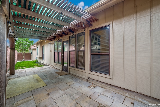 view of terrace featuring a pergola