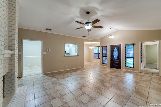 unfurnished room featuring ornamental molding, a healthy amount of sunlight, ceiling fan, and lofted ceiling