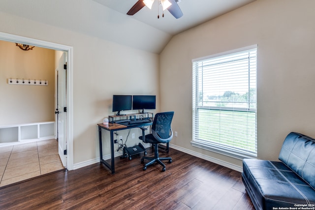 office area with plenty of natural light, dark hardwood / wood-style flooring, and ceiling fan