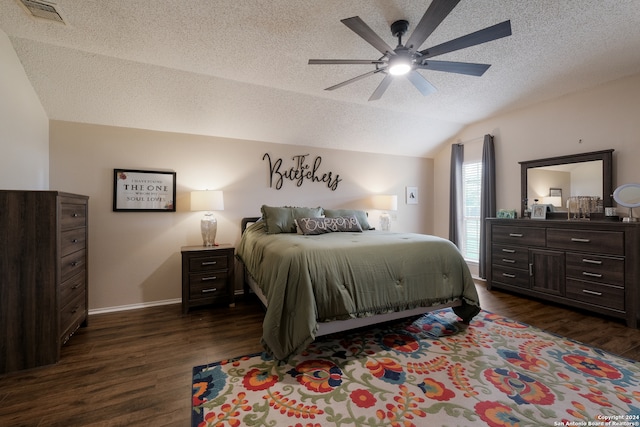 bedroom featuring ceiling fan, a textured ceiling, vaulted ceiling, and dark hardwood / wood-style flooring