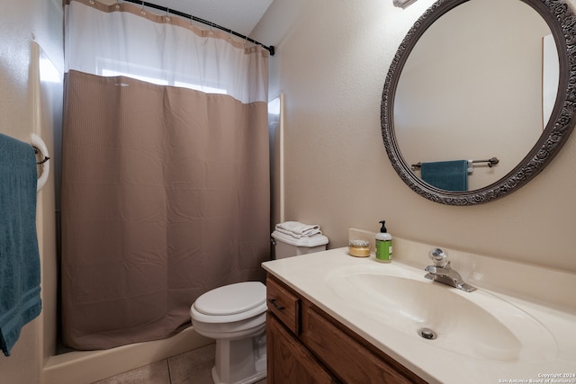 bathroom featuring tile patterned flooring, vanity, toilet, and a shower with shower curtain