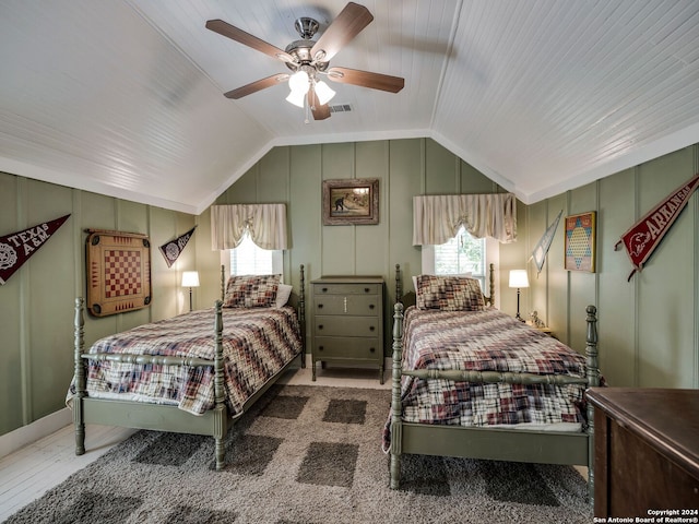 bedroom with lofted ceiling and ceiling fan