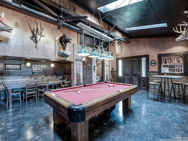 rec room featuring brick wall and billiards