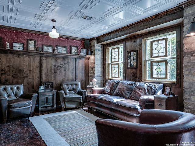 living room with wooden walls