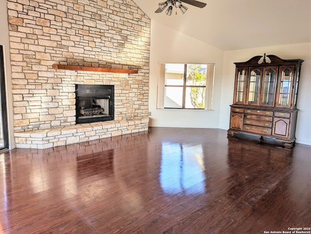 unfurnished living room with a fireplace, ceiling fan, dark wood-type flooring, and lofted ceiling