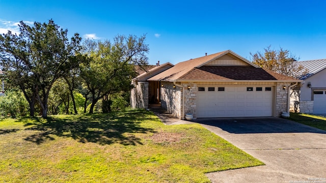 single story home with a front lawn and a garage