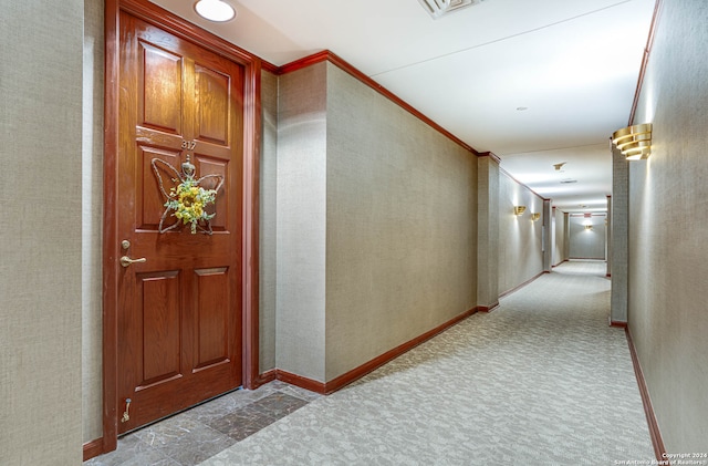 hallway featuring light tile flooring