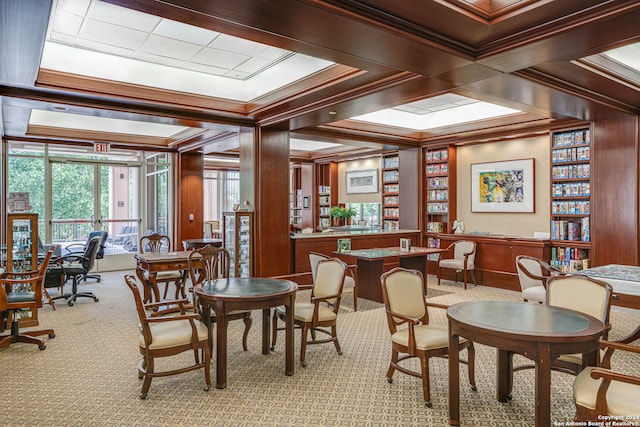 carpeted dining area featuring coffered ceiling and crown molding